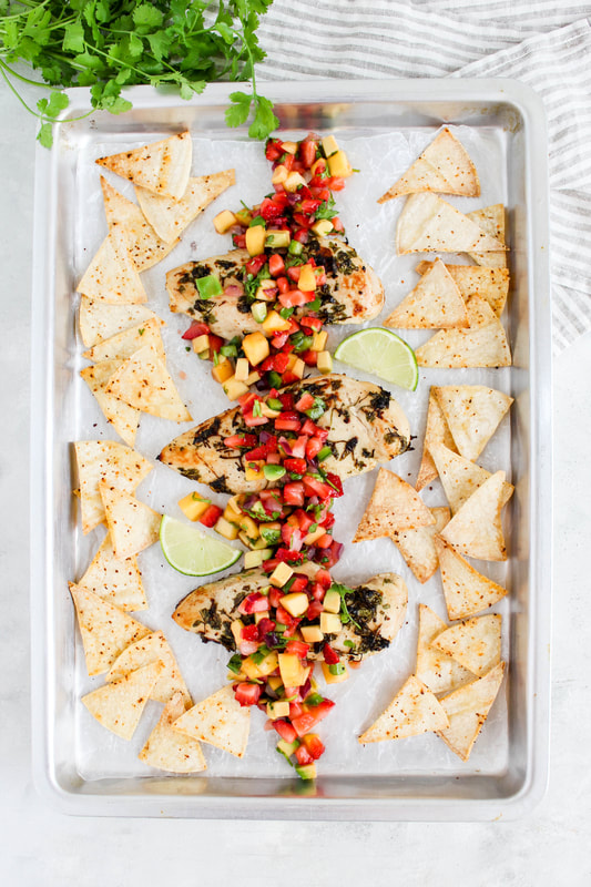 sheet pan chicken with strawberry mango salsa